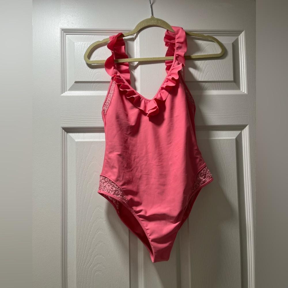 - - Pink one-piece swimsuit, size M ruffles and transparency